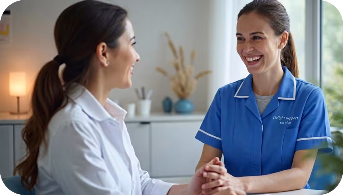 A carer and client having a consultation at home