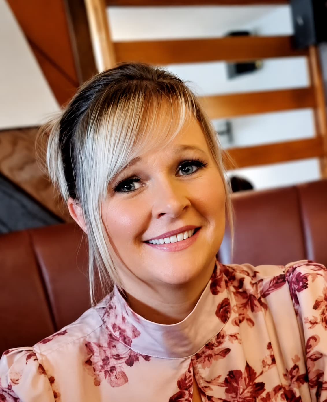 Lisa Goddard, Registered Manager at Delight Support Services, smiling and wearing a white shirt